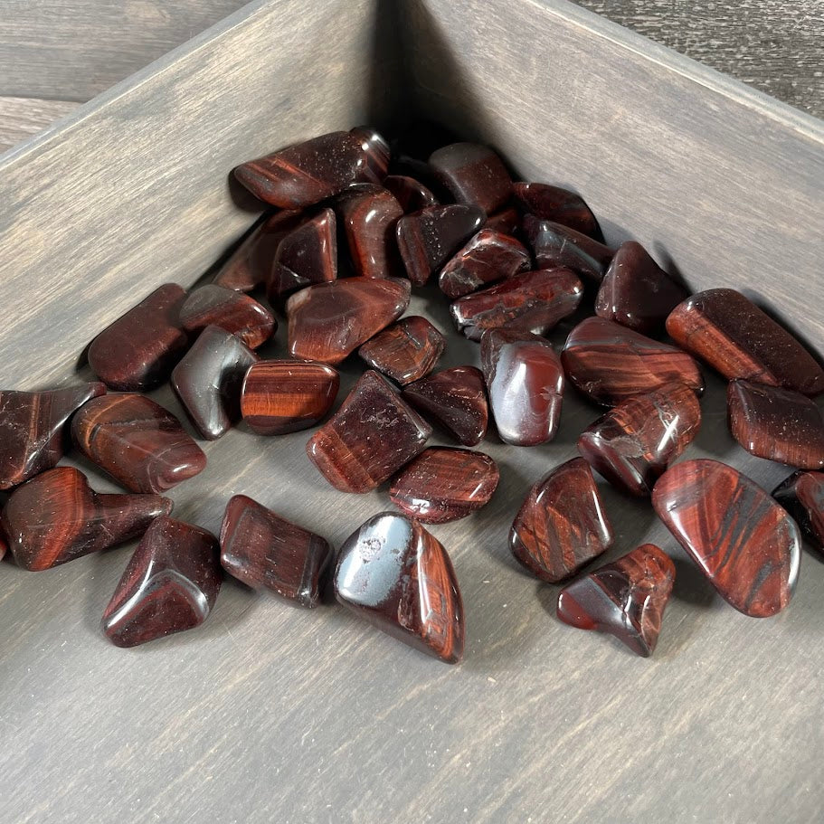 Bulk Red Tiger's Eye tumbled stones for retailers and gift shops