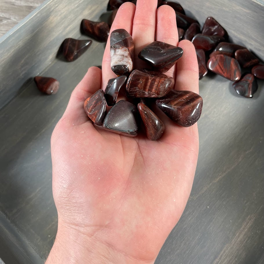 Deep red chatoyant Red Tiger's Eye stones tumbled and polished