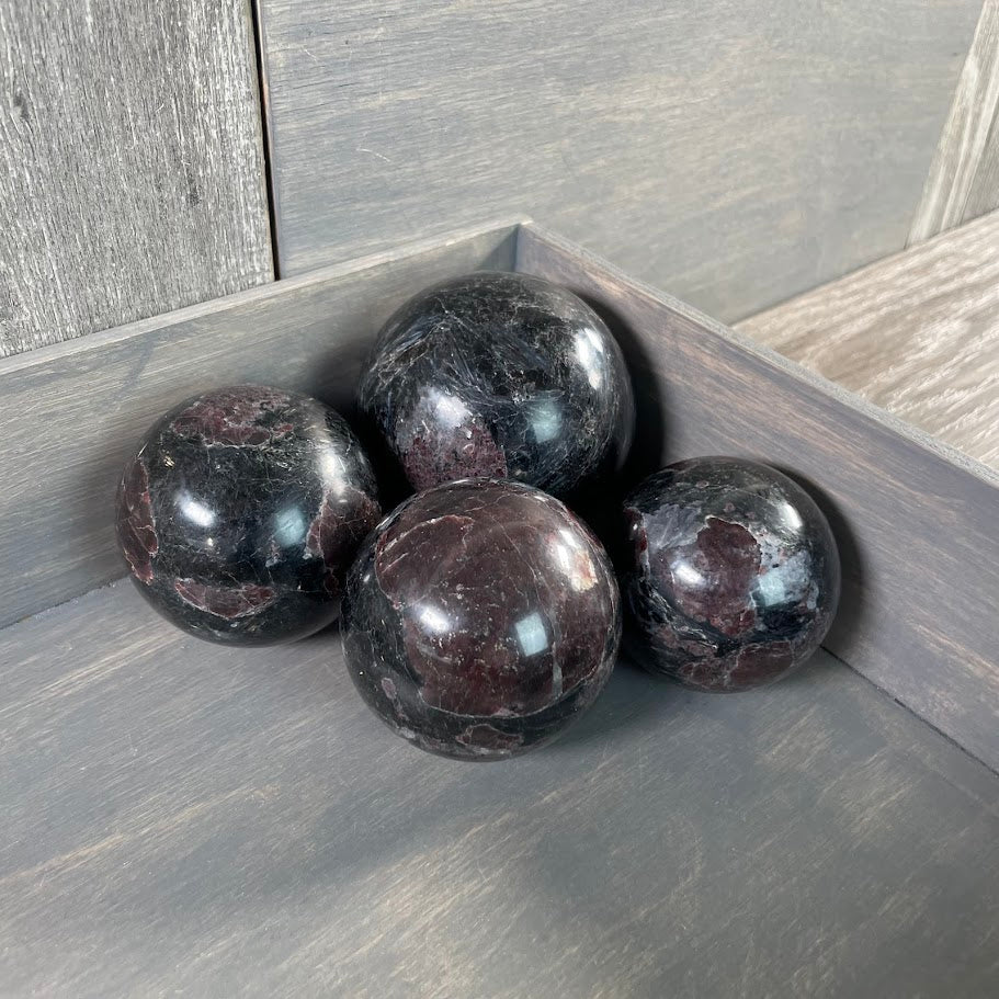 Astrophyllite with garnet spheres for Metaphysical Shops.