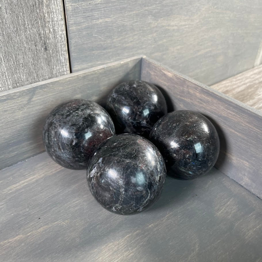 Astrophyllite with garnet spheres for retailers.