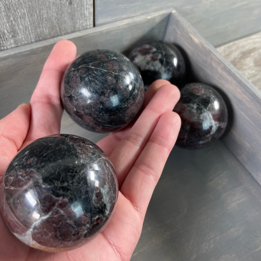 Lot of 4 astrophyllite with garnet spheres; perfect for crystal shops.