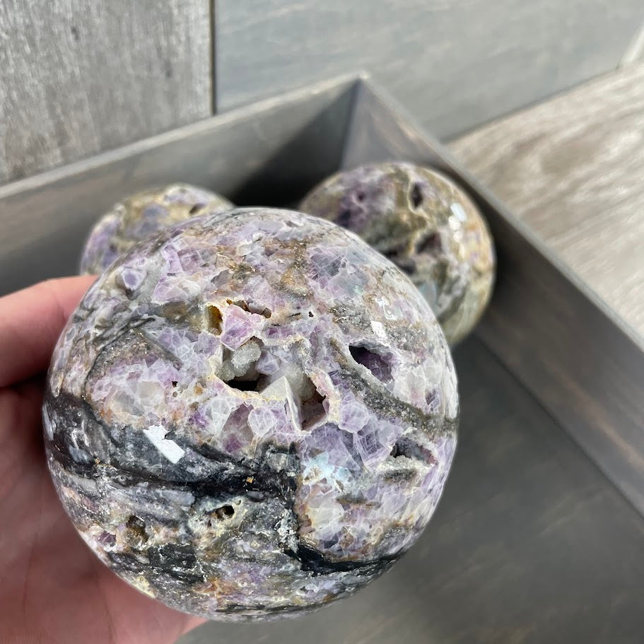 Lot of 3 fluorite vug spheres; for resale.