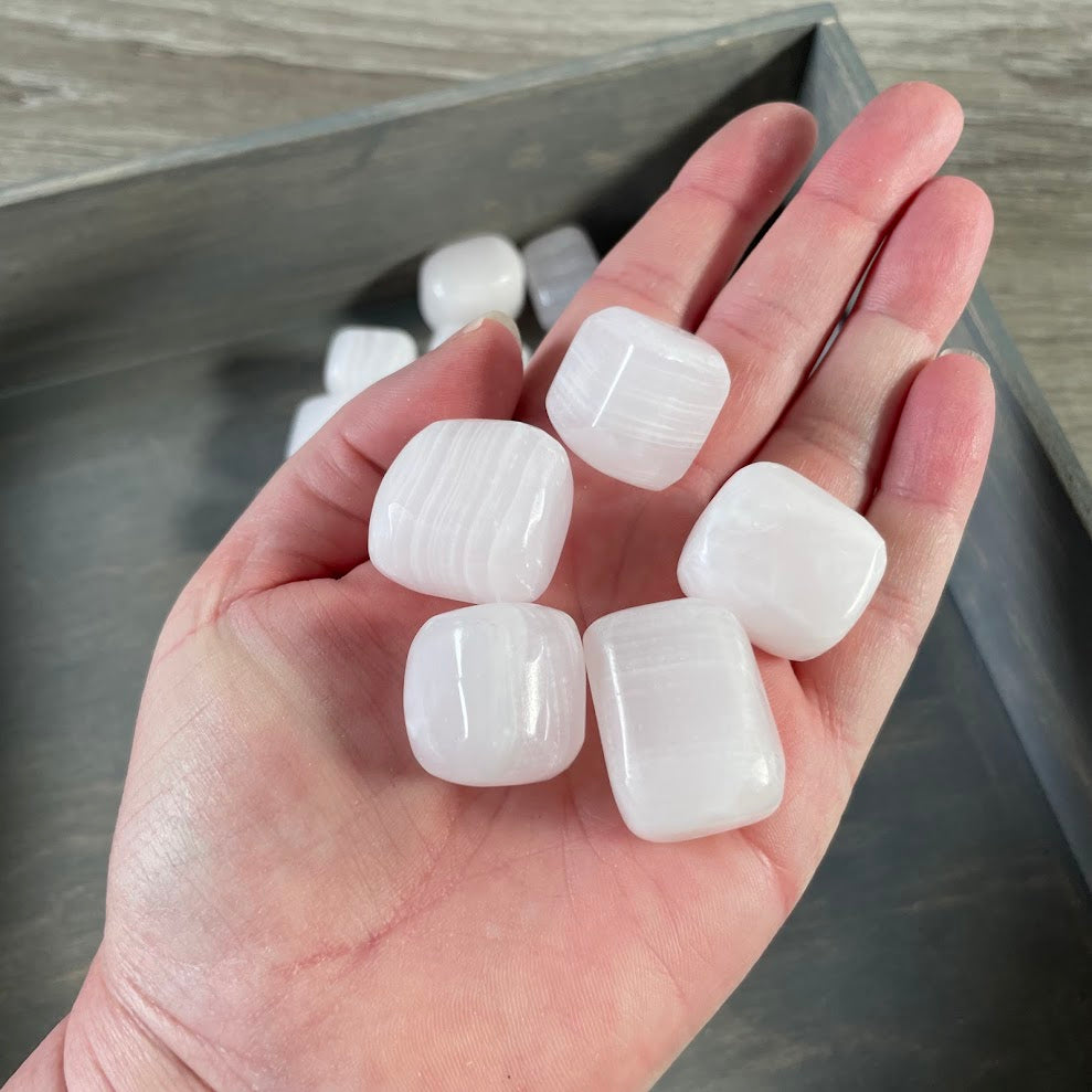 pink calcite tumbled stones for crystal shops