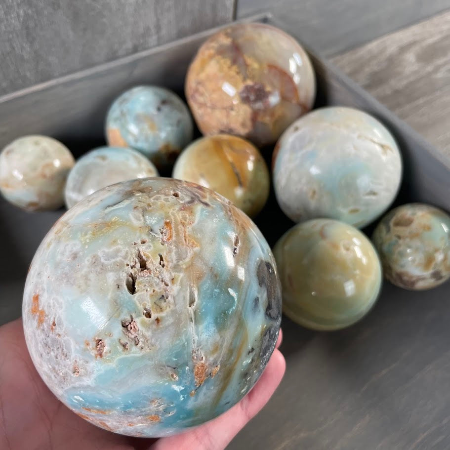Amazonite spheres for resale.