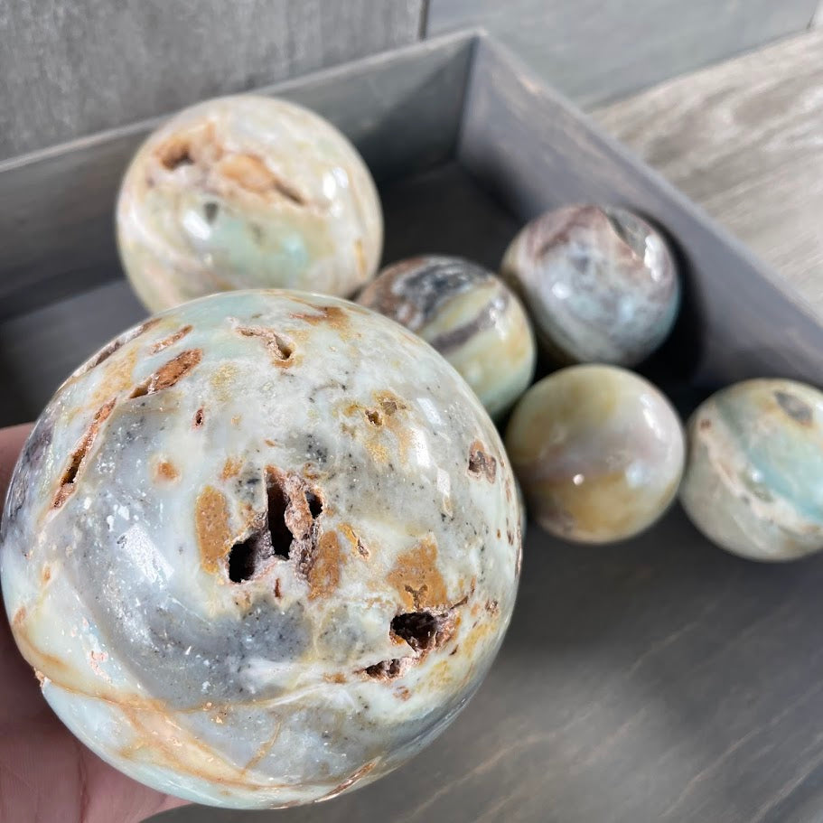 Amazonite spheres for metaphysical shops.