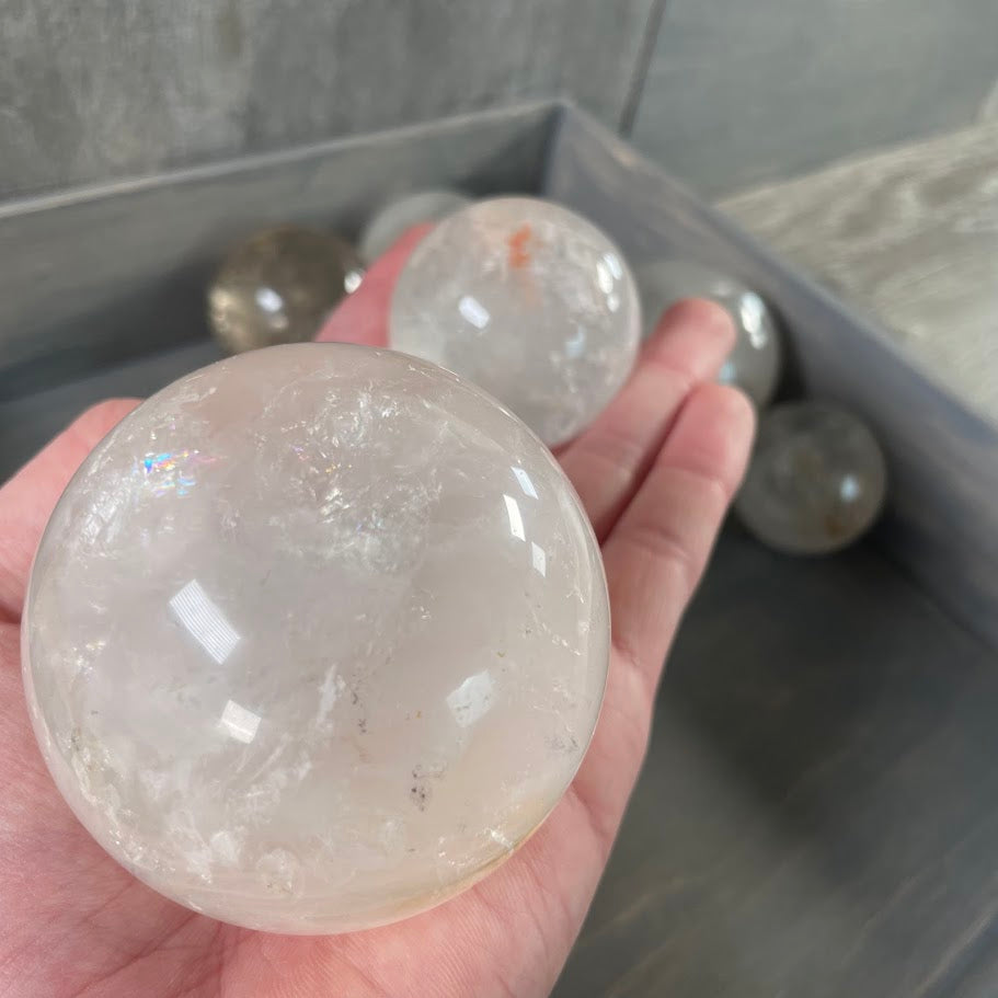 Bulk wholesale lot of quartz spheres.