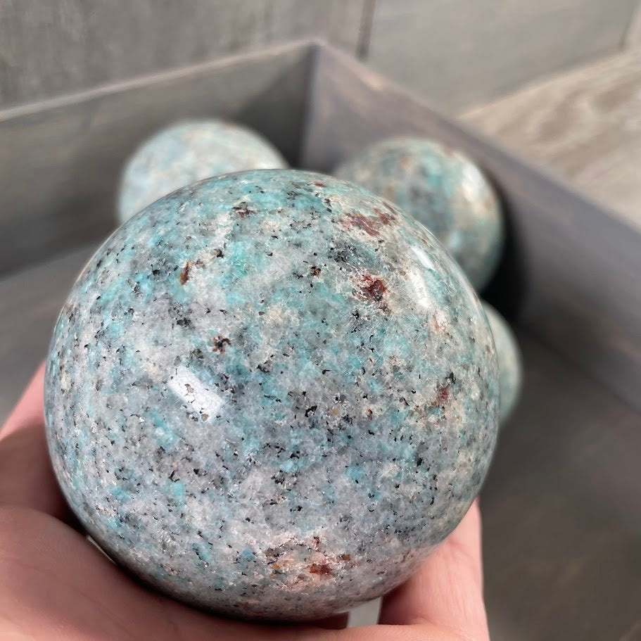amazonite with biotite healing stone spheres for wholesale.