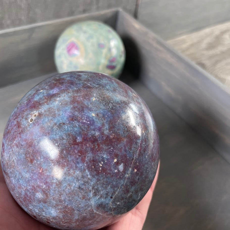 Wholesale ruby in kyanite sphere and ruby zoisite sphere.