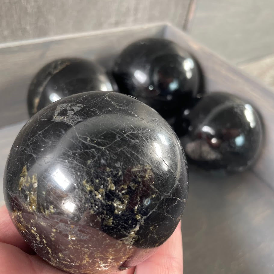 Black tourmaline wholesale polished gemstone spheres for retailers.