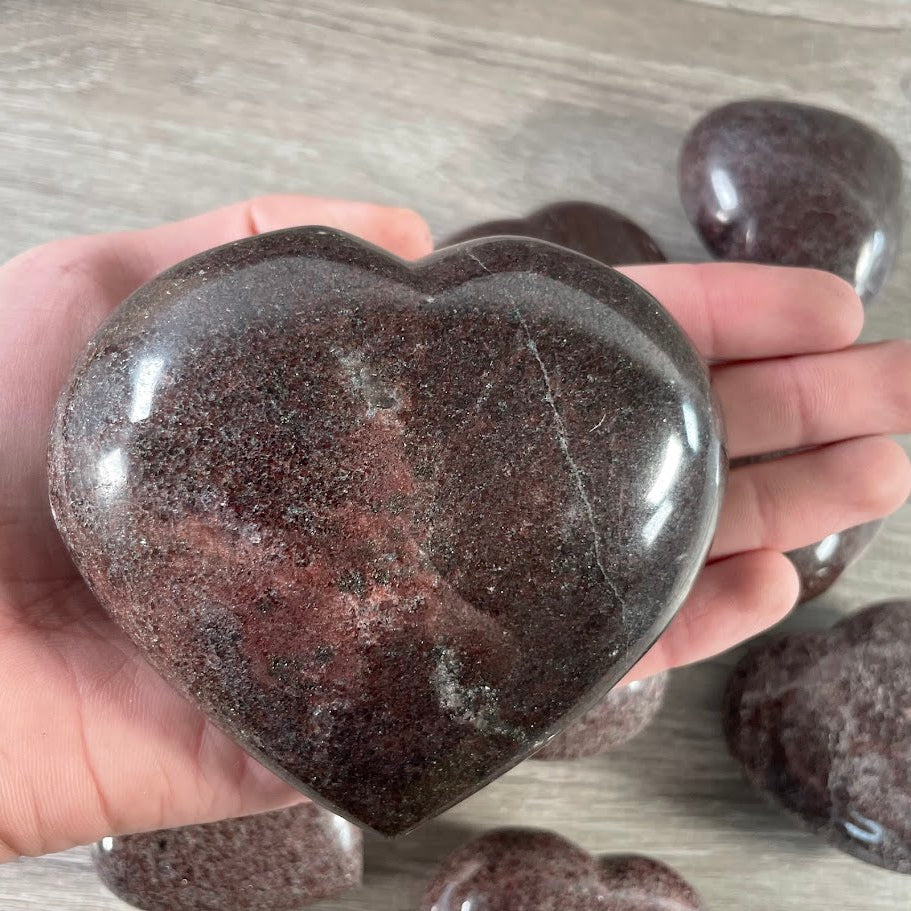 garnet crystal gemstone hearts for spiritual healing display