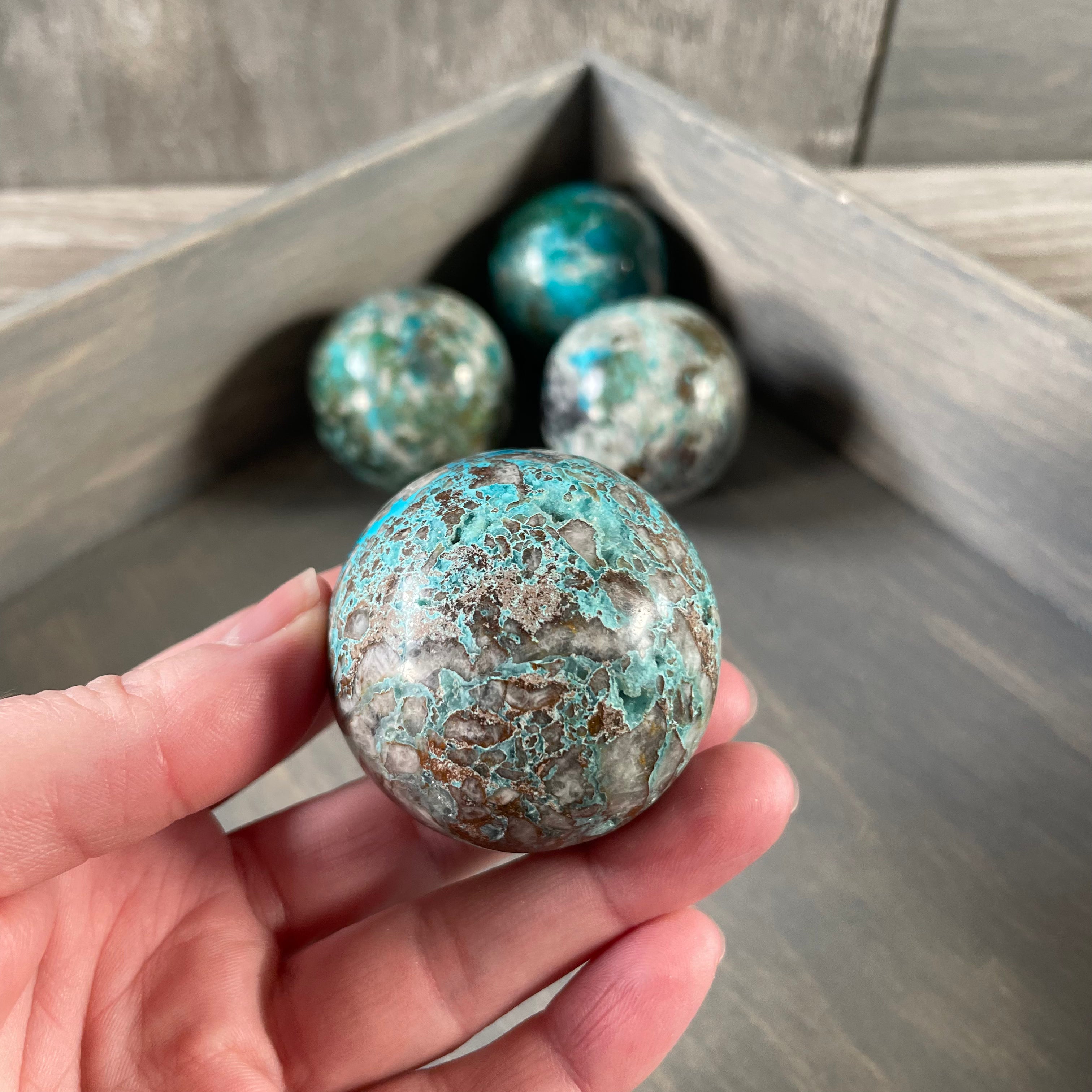 Natural Chrysocolla spheres for retail resale