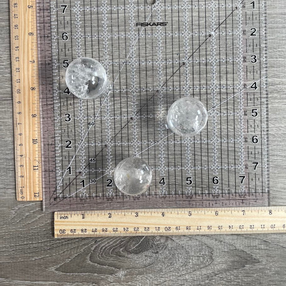 Wholesale Clear Quartz Sphere 30-36mm – Crystal Energy Sphere Bulk