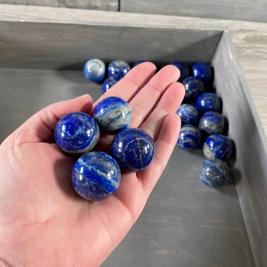 Bulk Lapis Lazuli crystal spheres 24-30mm.