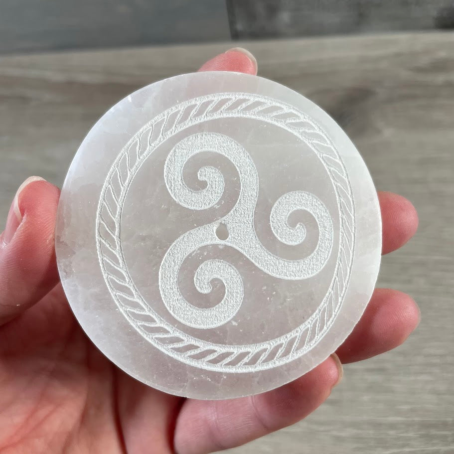 etched Celtic symbol on selenite