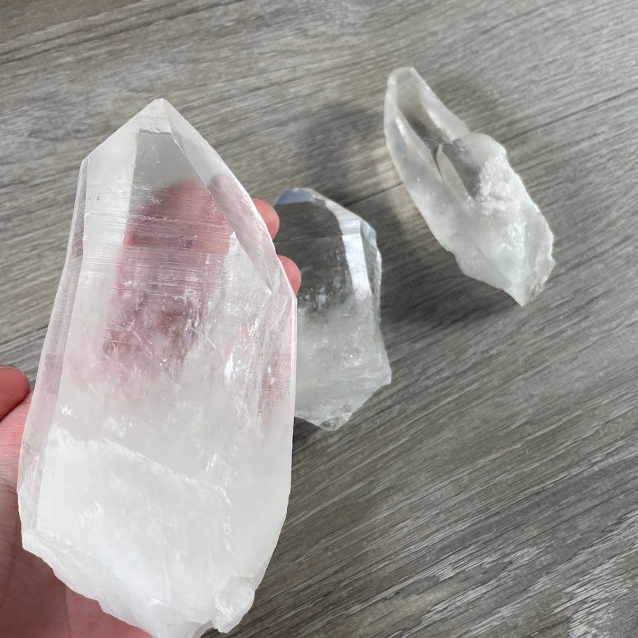Lot of three lemurian quartz points for resale