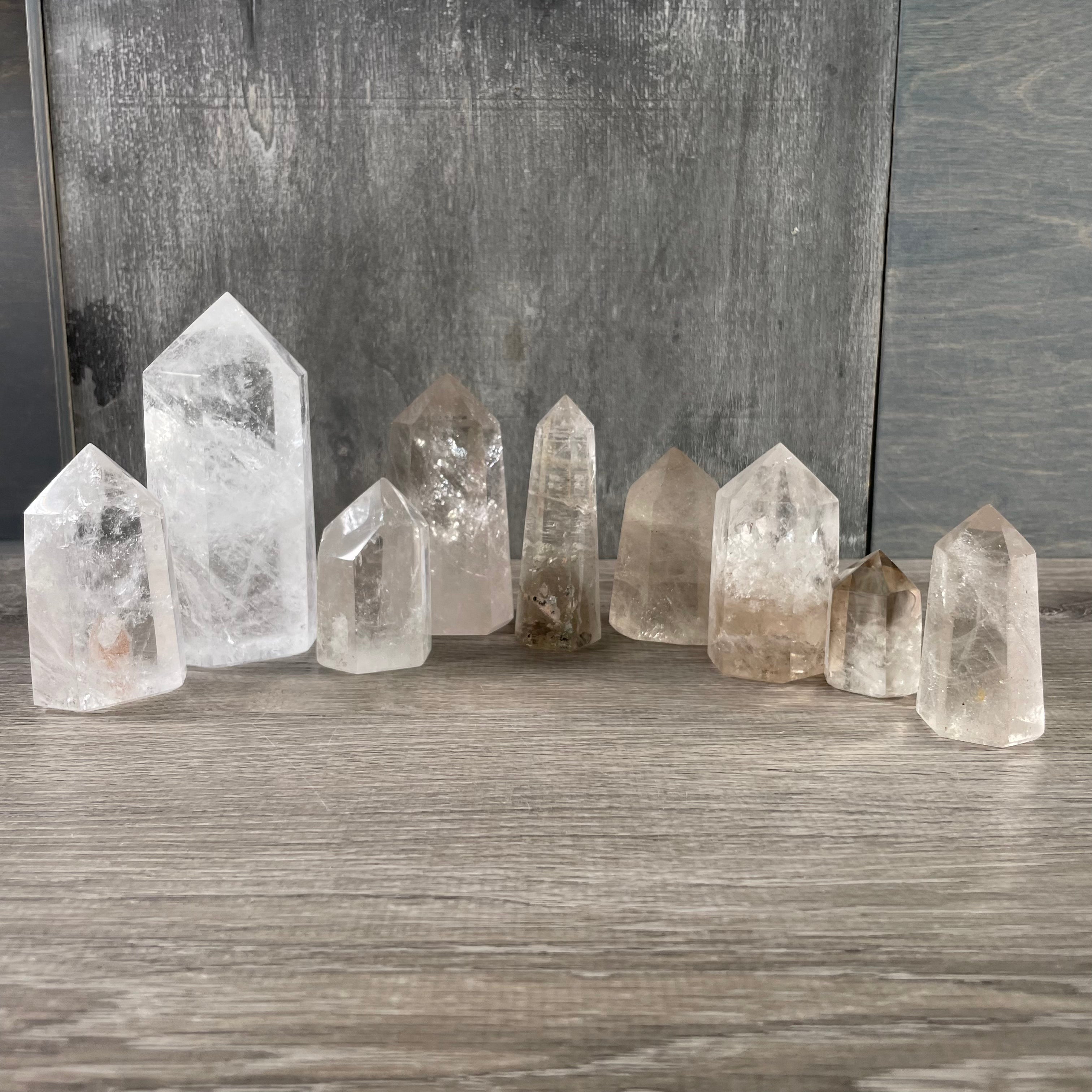 quartz natural stone obelisks displayed in group