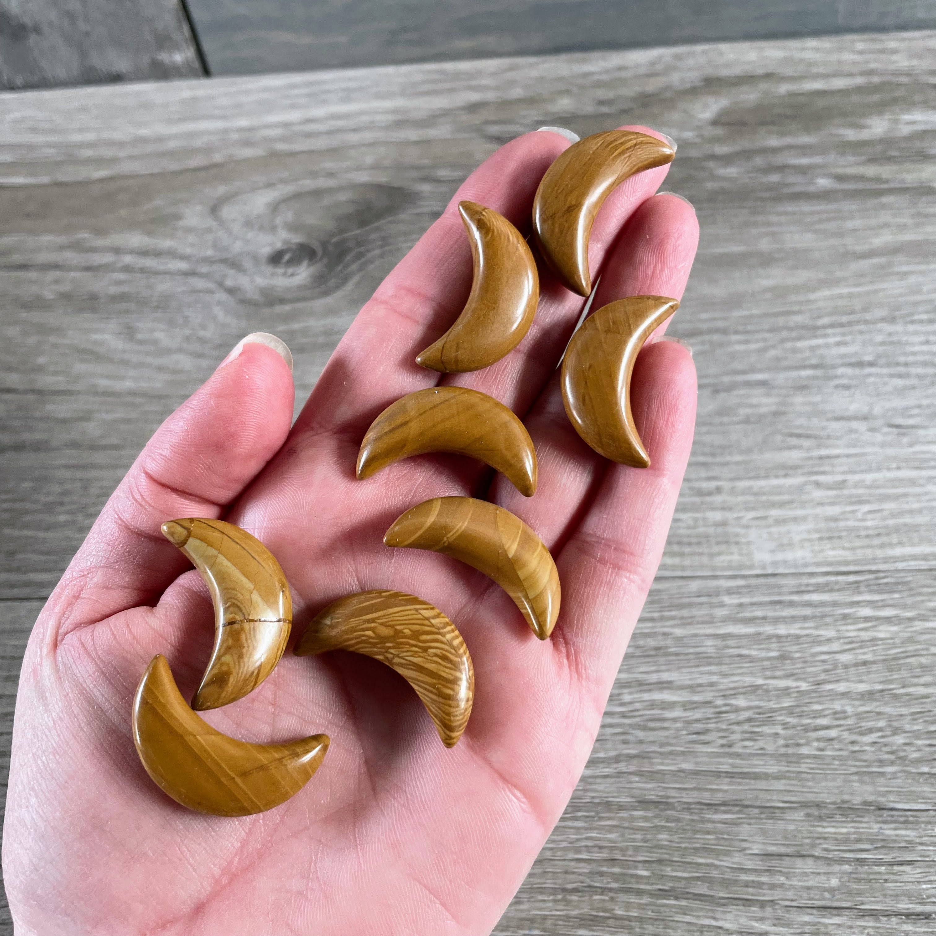 Wood Lace 1-inch gemstone moon carvings for rock shops