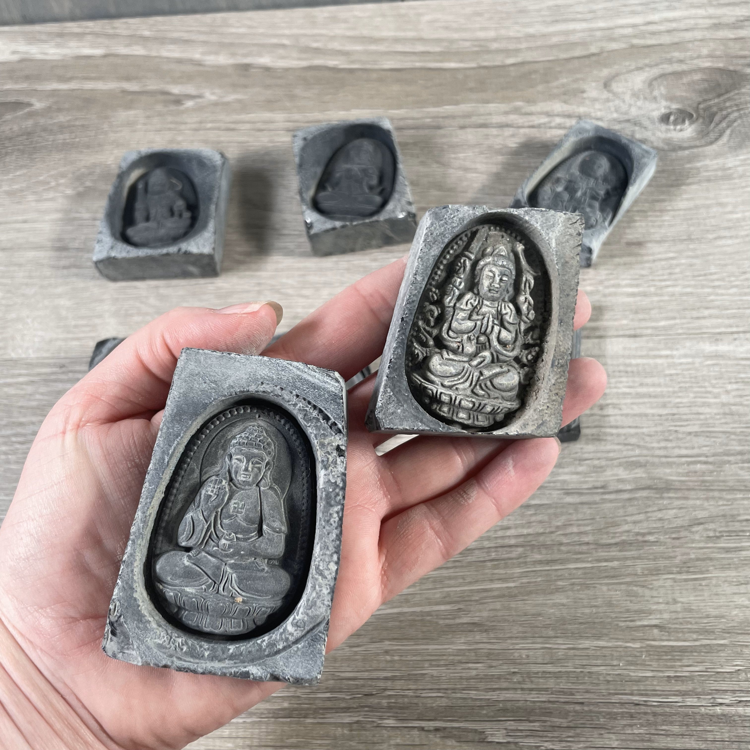 obsidian deity carved tiles for new age shops