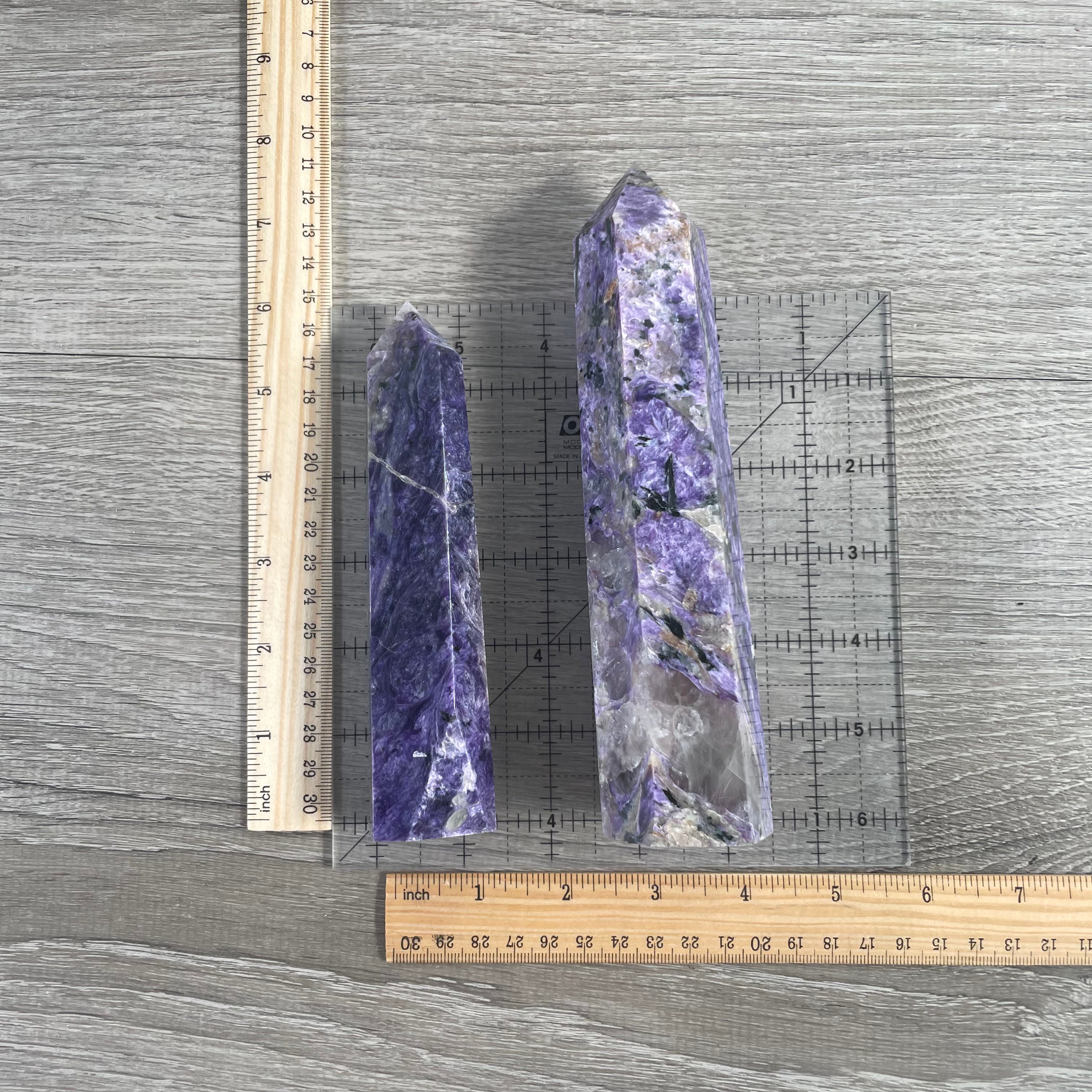Large charoite crystal obelisk with natural patterns