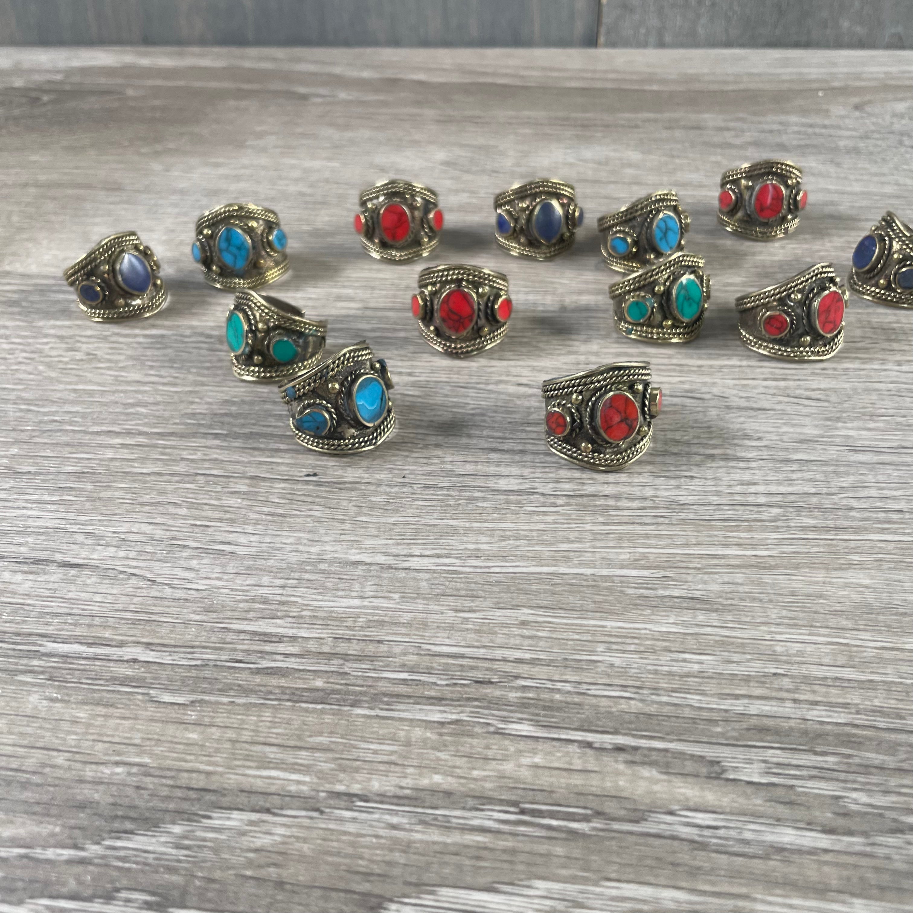 Assorted stone rings with adjustable bands