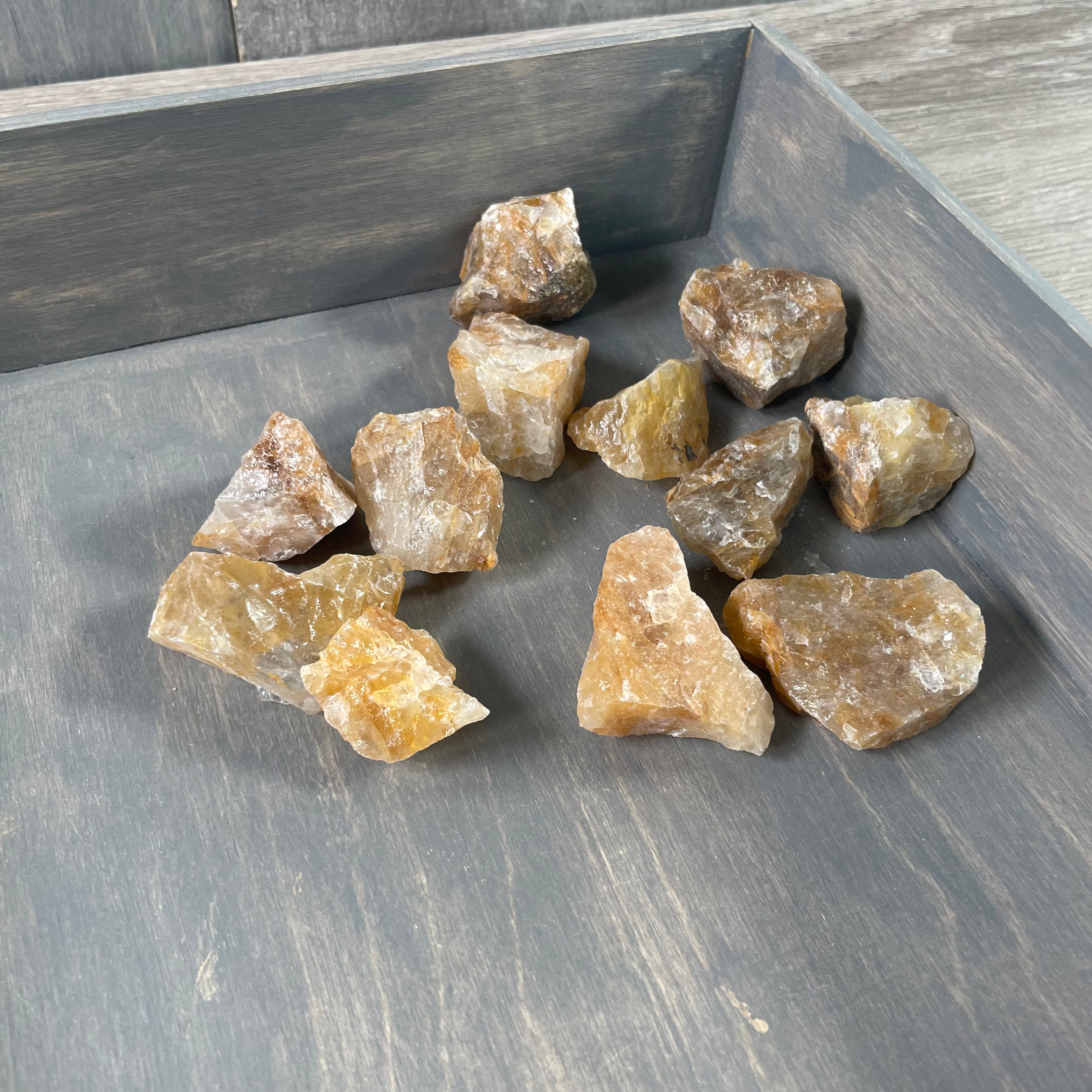 Rough golden healer quartz stones in a 1-pound wholesale bag