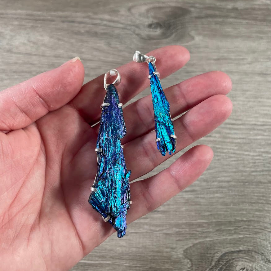 assortment of titanium kyanite sterling silver pendants for metaphysical shops