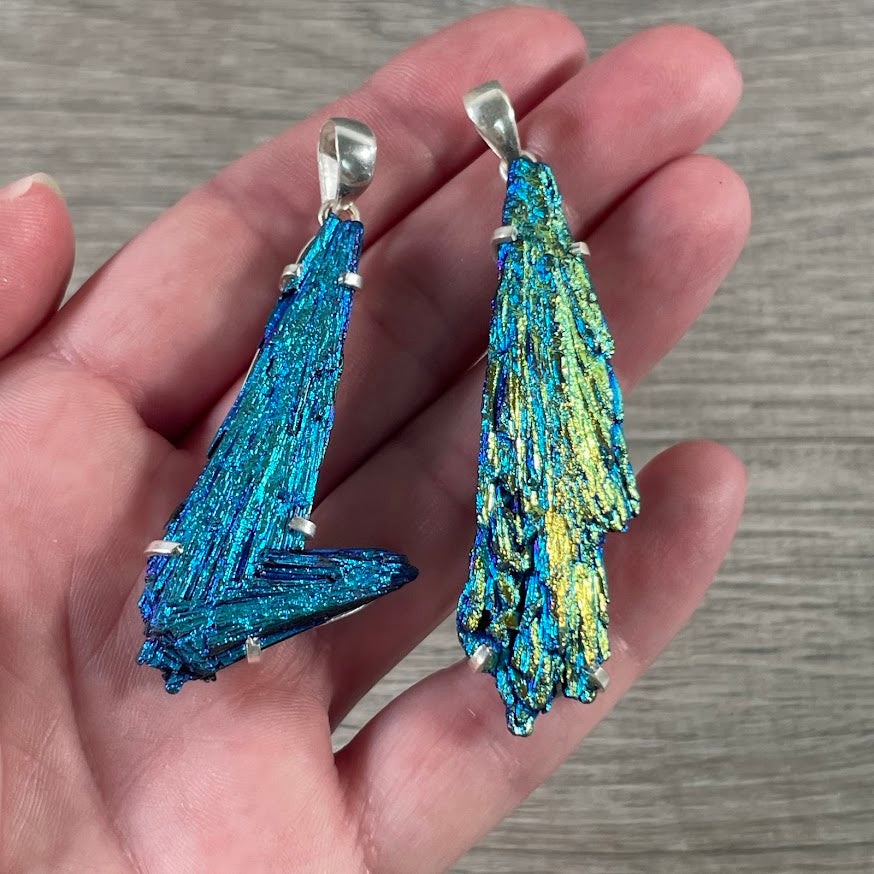 metaphysical silver pendant with titanium kyanite blade for new age stores