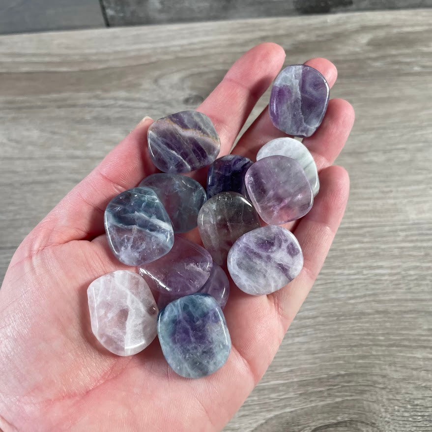 Fluorite small ooal crystal palm stones for meditation and spiritual shops
