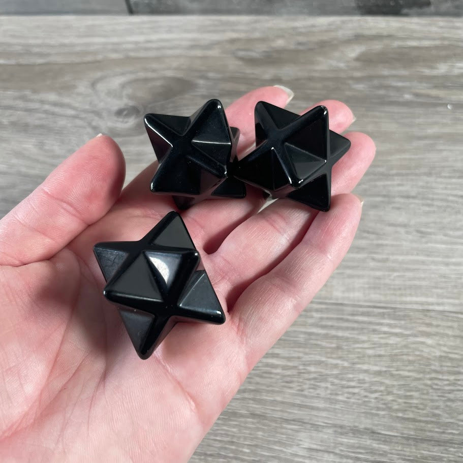 Obsidian carved Merkaba crystal for metaphysical retail