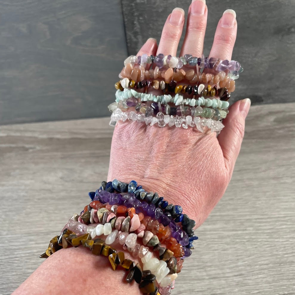 layering inexpensive ship bracelets for gift shops