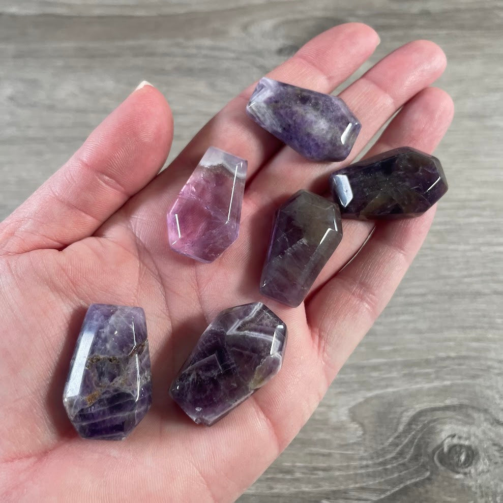 Amethyst small carved coffin figurines