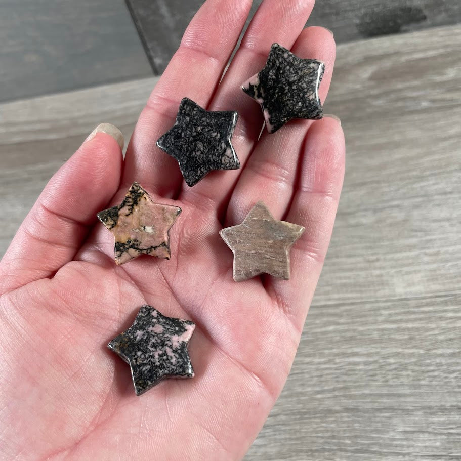 Rhodonite gemstone stars for metaphysical retail