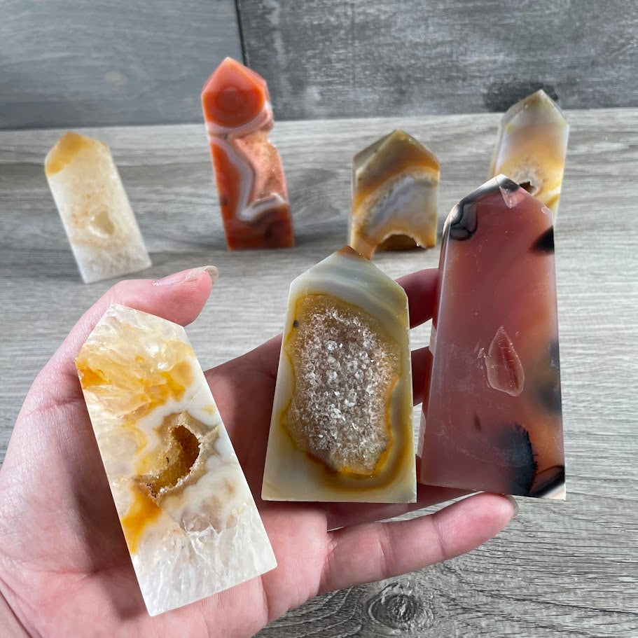 Bulk carnelian druzy crystal towers for wholesale display