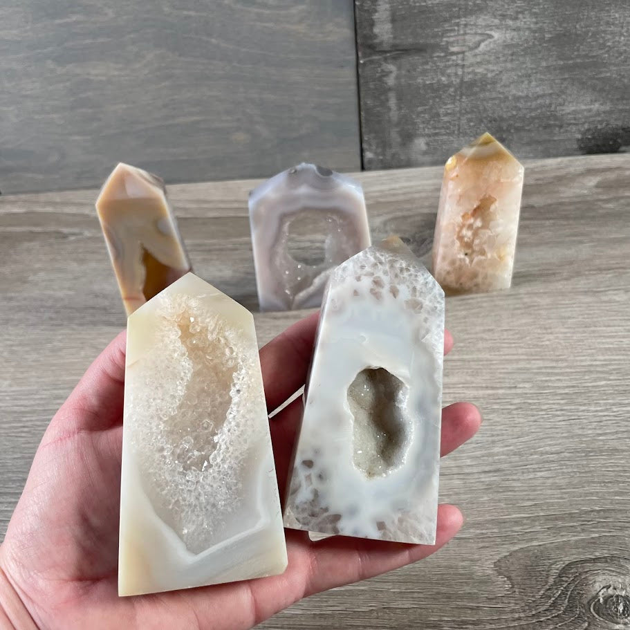 Crystal obelisks made of shimmering druzy agate stone