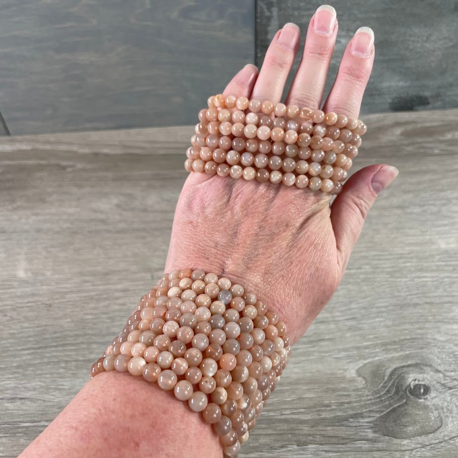 Peach moonstone metaphysical shop supplies - stacking bracelets