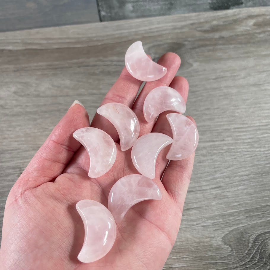 rose quartz pocket-sized crystal moon carving