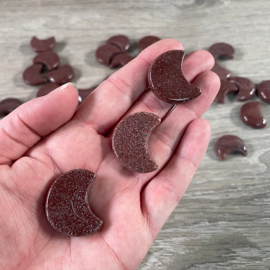 red aventurine crescent moon crystals