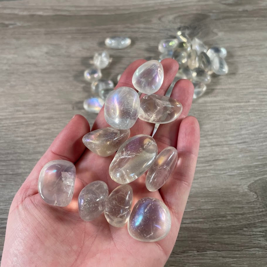 Bulk bag of Angel Aura Quartz stones for crystal shops