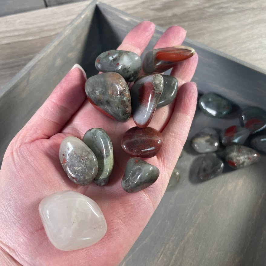 Natural African Bloodstone polished tumbled gemstones sold by the pound for crystal shops