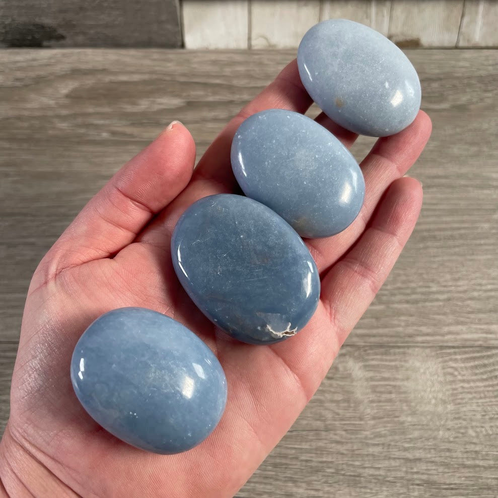 Wholesale gemstone palm stones angelite polished pocket stones for retailers