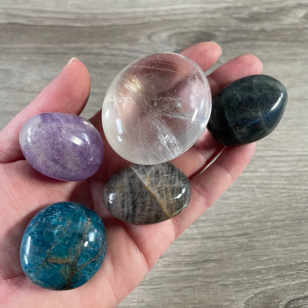 Wholesale gemstone palm stones by the ounce assorted crystals
