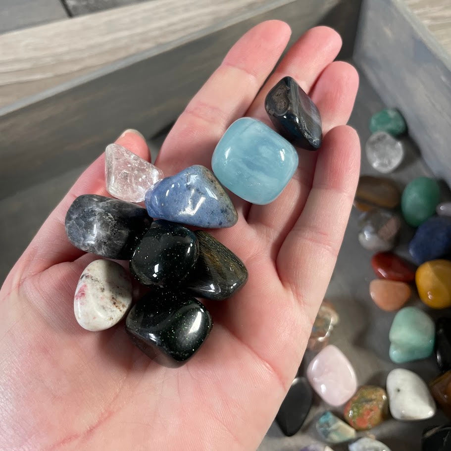 Assorted gemstone tumbled stones bulk crystal lot with varied colors patterns and sizes
