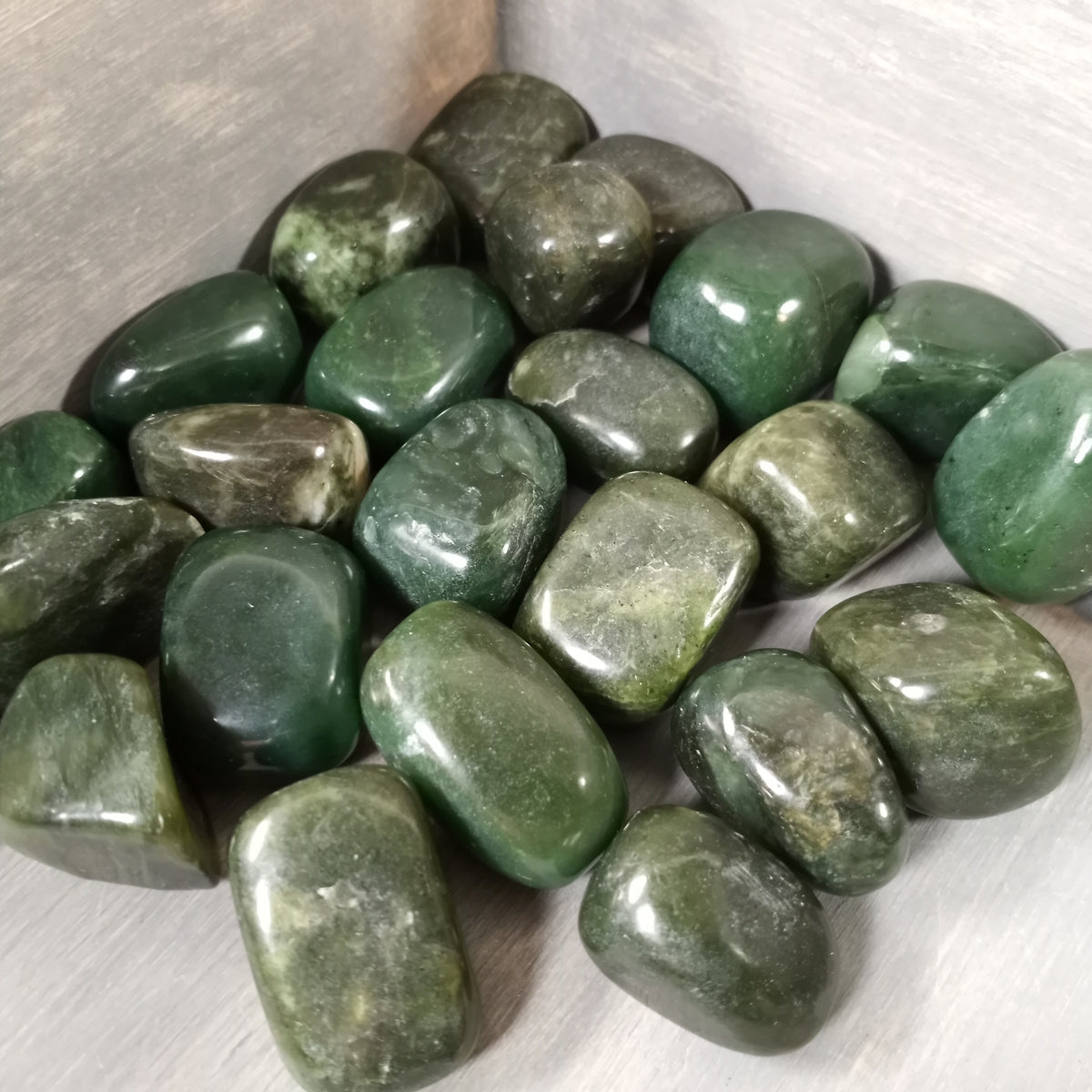 Bulk British Columbia jade stones with smooth polished finish for crystal and gemstone retailers