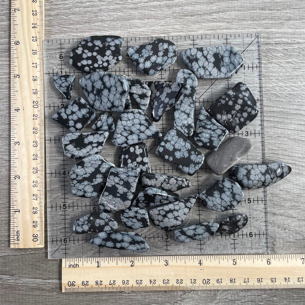 Natural polished Snowflake Obsidian gemstones sold by the pound for crystal stores, metaphysical shops, and resale
