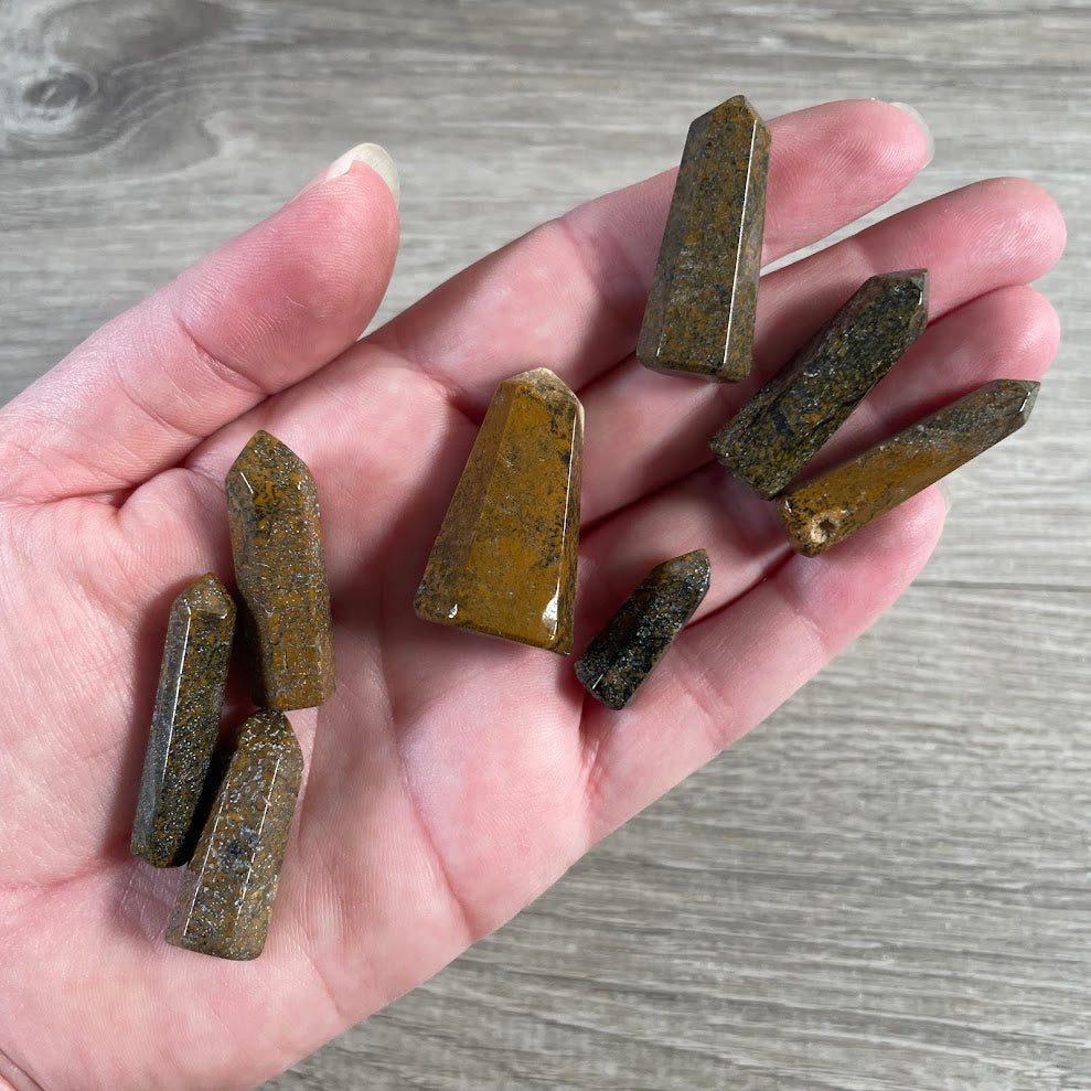 Brazilian small cosmic jasper crystal obelisk handmade from polished natural gemstone.