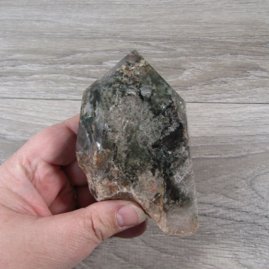 Large quartz point with green phantom chlorite inclusions