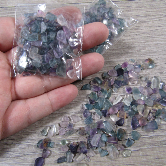 Fluorite small polished gemstone chips in clear wholesale bag