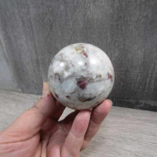 pink tourmaline in quartz sphere