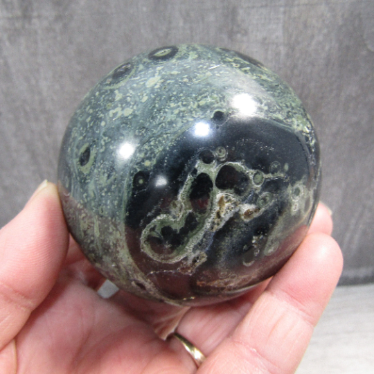 Polished Kambaba Jasper stone sphere for gift store displays