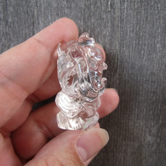 hand-carved clear quartz crystal deity figurine